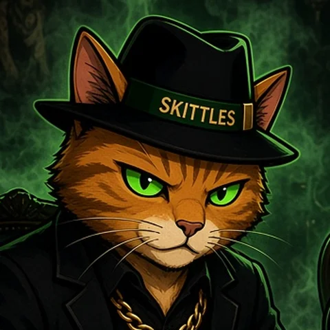 Skittles, orange tabby in a black fedora